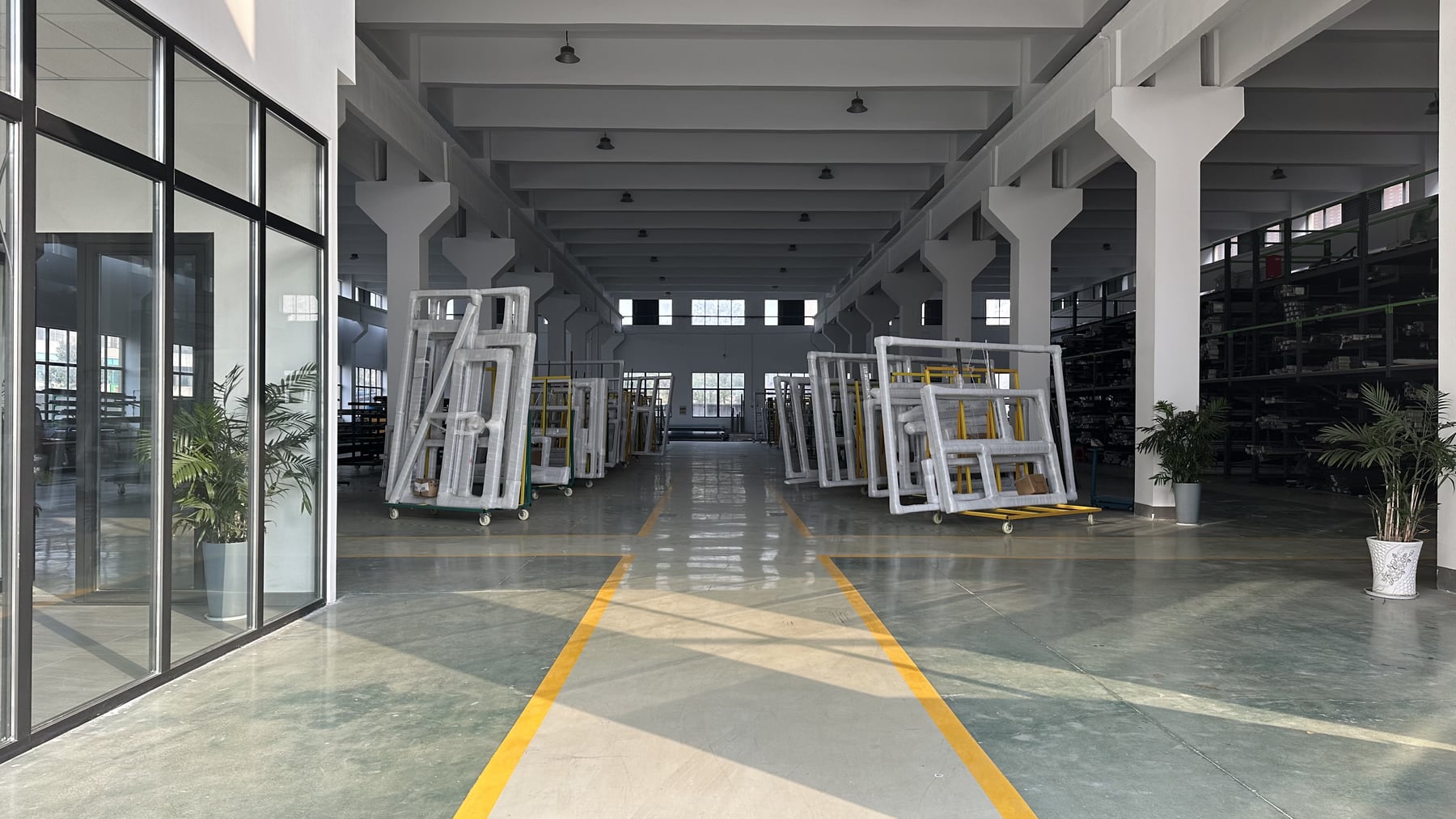 Packed finished window and door products inside the ROTIN factory